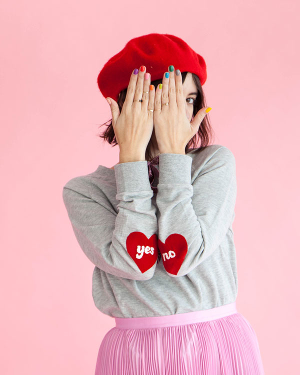 heart on sleeve sweatshirt